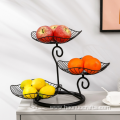 A three-tiered fruit basket